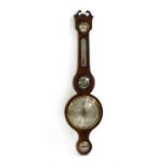 A mahogany wheel barometer