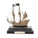 A silver model of The Mayflower,