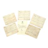 A group of six birth certificates