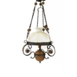 A wrought iron and copper mounted hanging ceiling light,