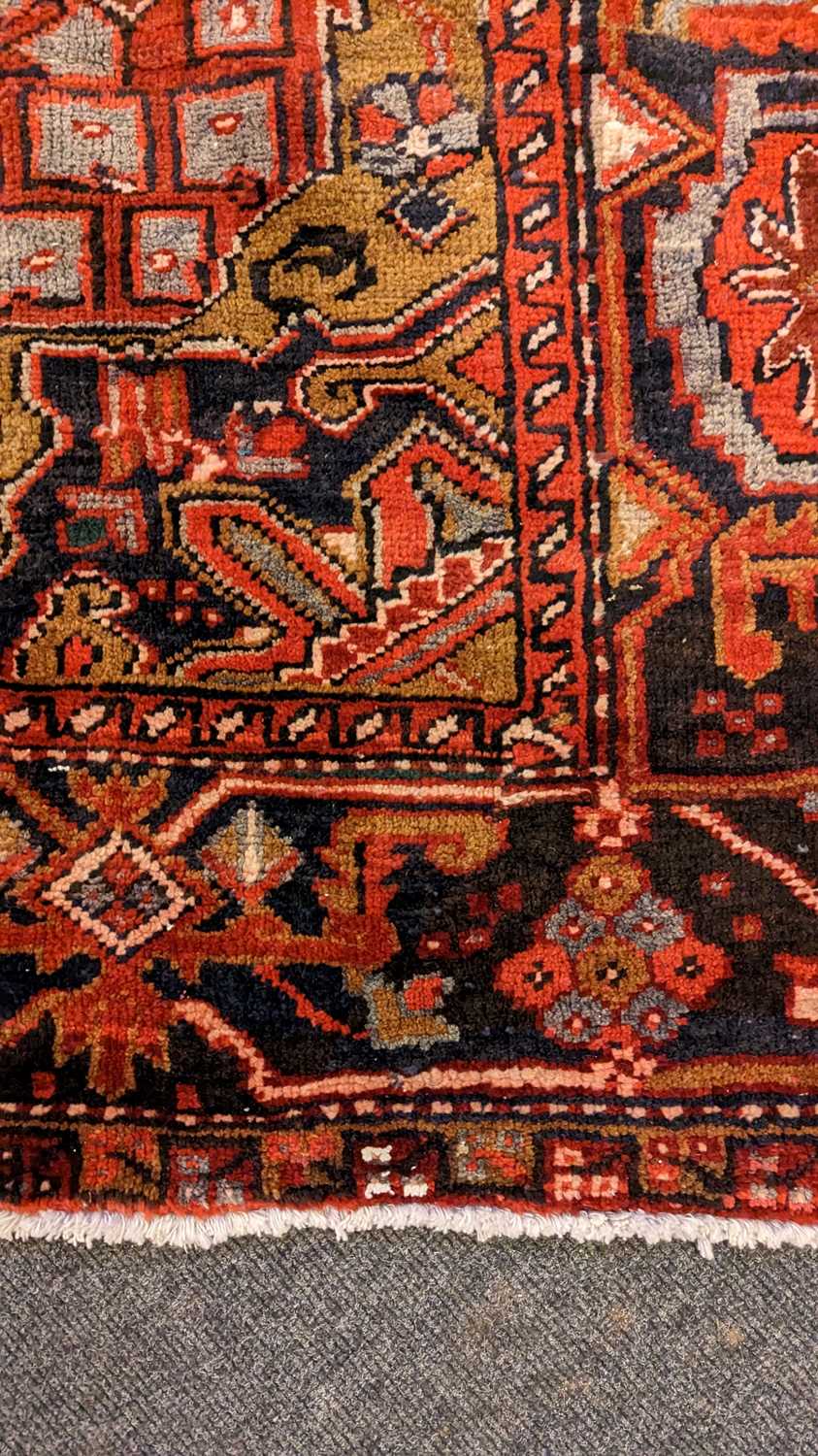 A Heriz carpet - Image 13 of 26