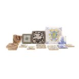 A collection of pottery tiles,