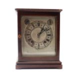 A mahogany mantel clock,