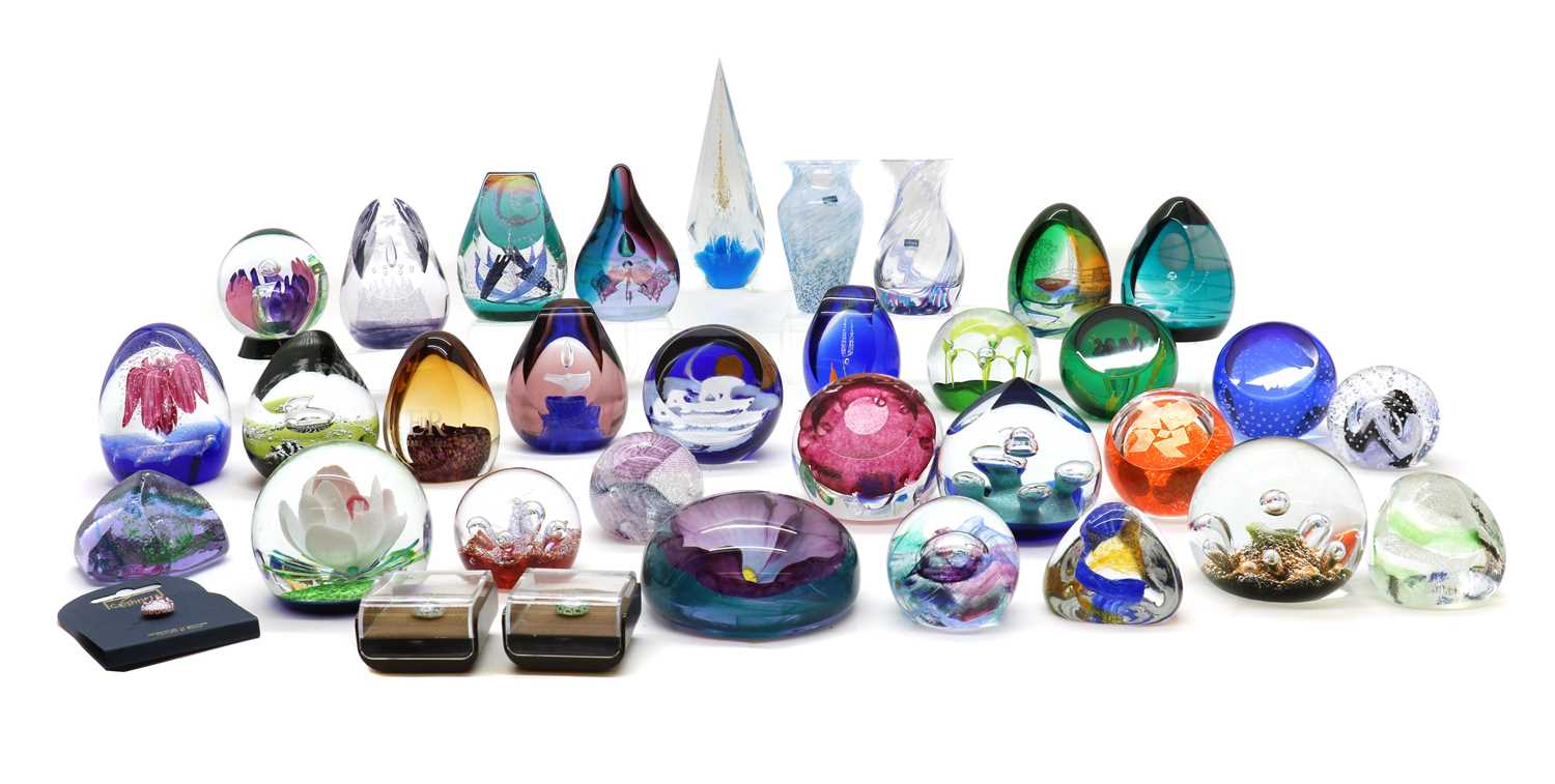 A collection of boxed Caithness glass paperweights,