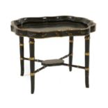 A black lacquer chinoiserie occasional table
