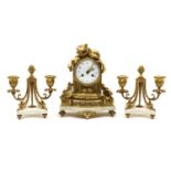 A French gilt metal and marble clock garniture