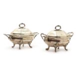 A pair of George IV silver sauce tureens,