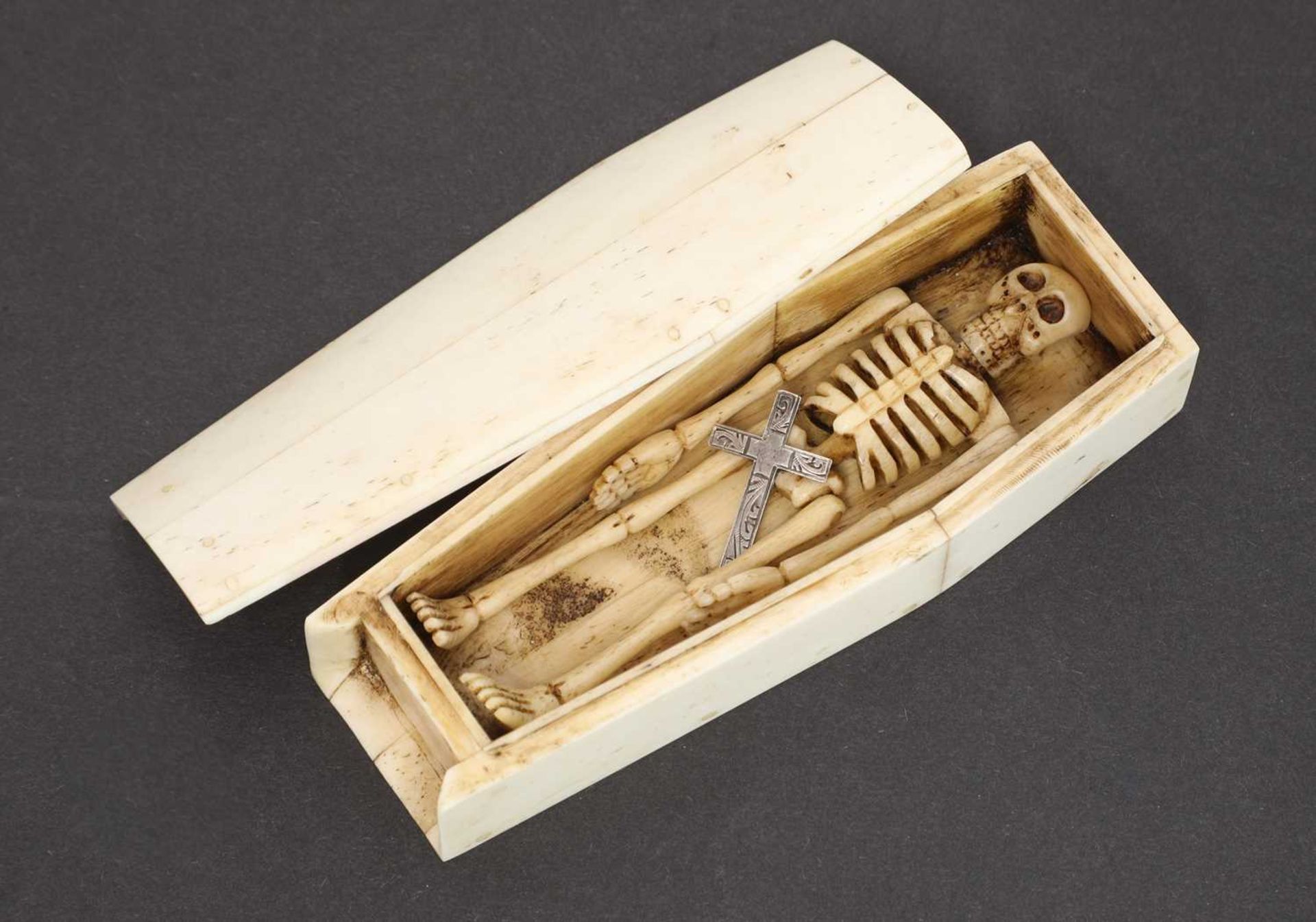 A carved bone casket,