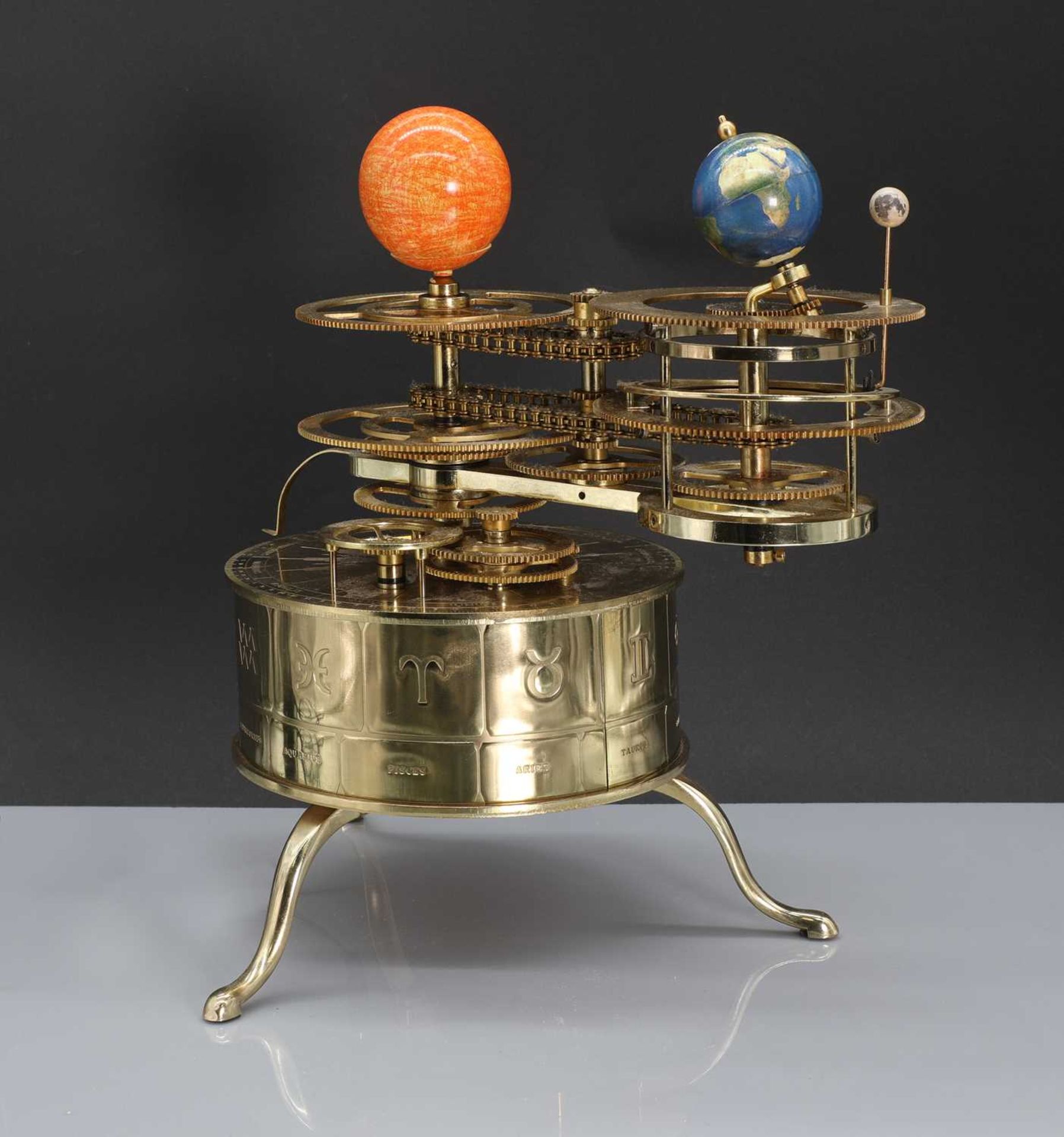 A brass planetarium,
