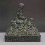 A figural bronze group,