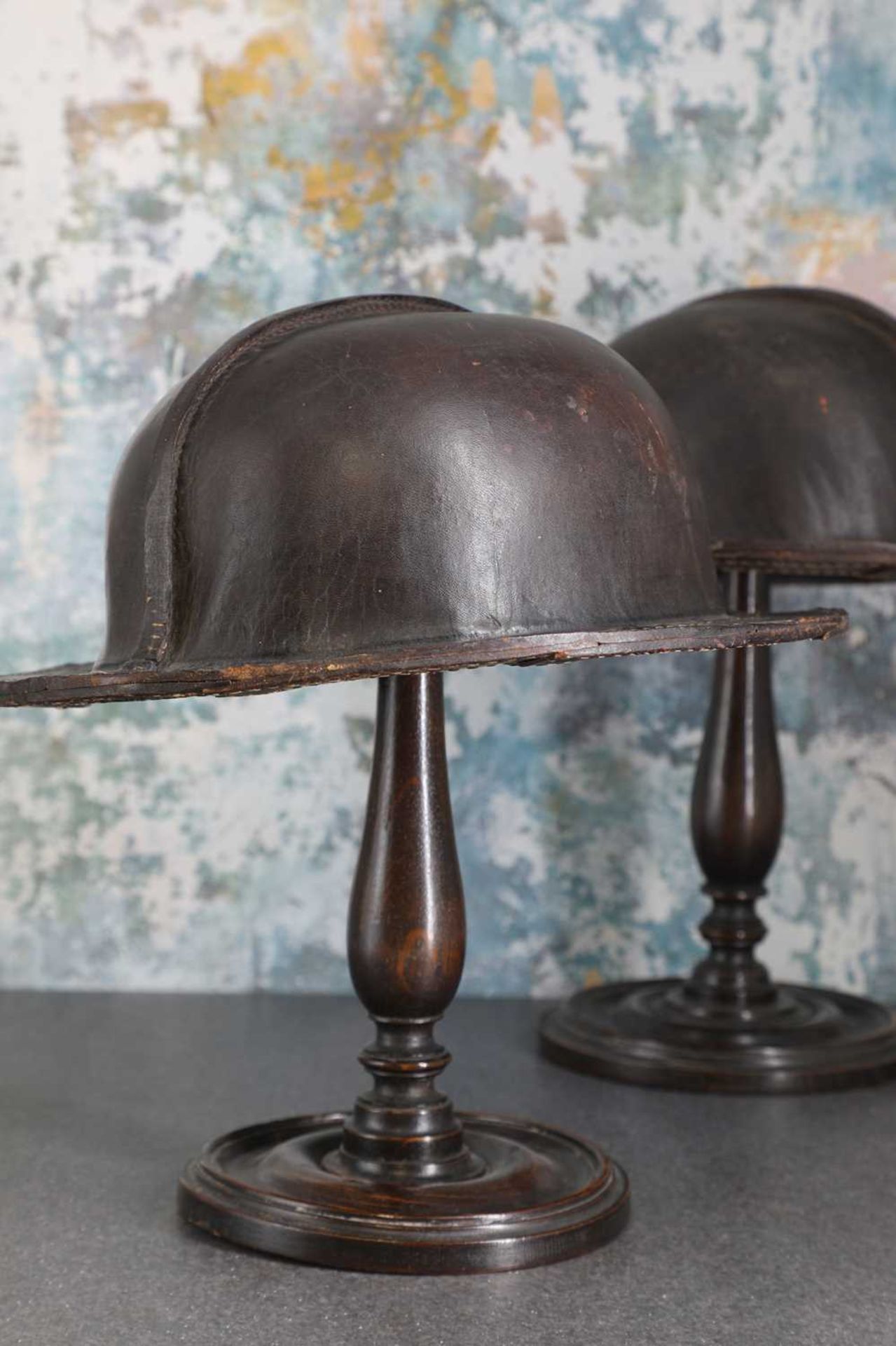 A pair of patinated leather miner's helmets, - Image 4 of 5