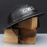 A World War II CWD (Civilian War Deaths) steel helmet,