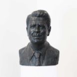 A large bronzed plaster bust of Ronald Reagan,