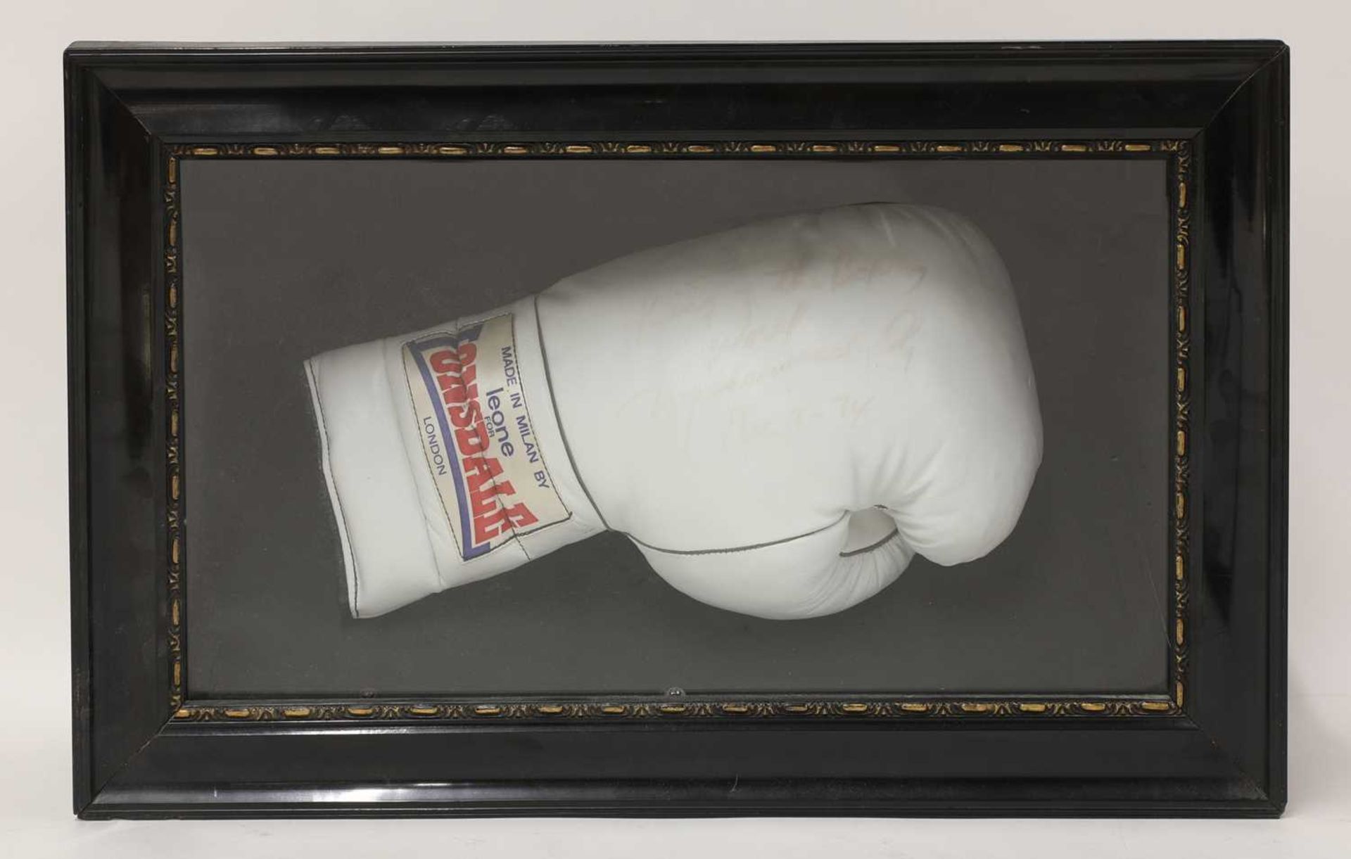 A Muhammed Ali autographed presentation glove,