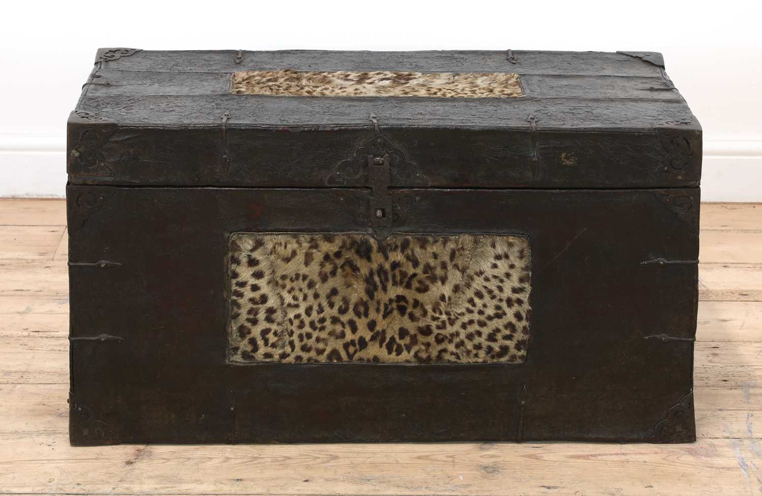 A yak skin and snow leopard fur-mounted travel trunk,