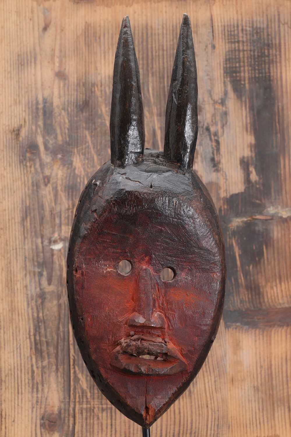 Dan society: a carved and patinated Dan mask, - Image 3 of 4