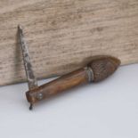 An unusual pressed horn figural pocket knife,