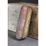 A copper and brass tobacco box,