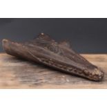 Itamul People: a carved and patinated canoe prow,
