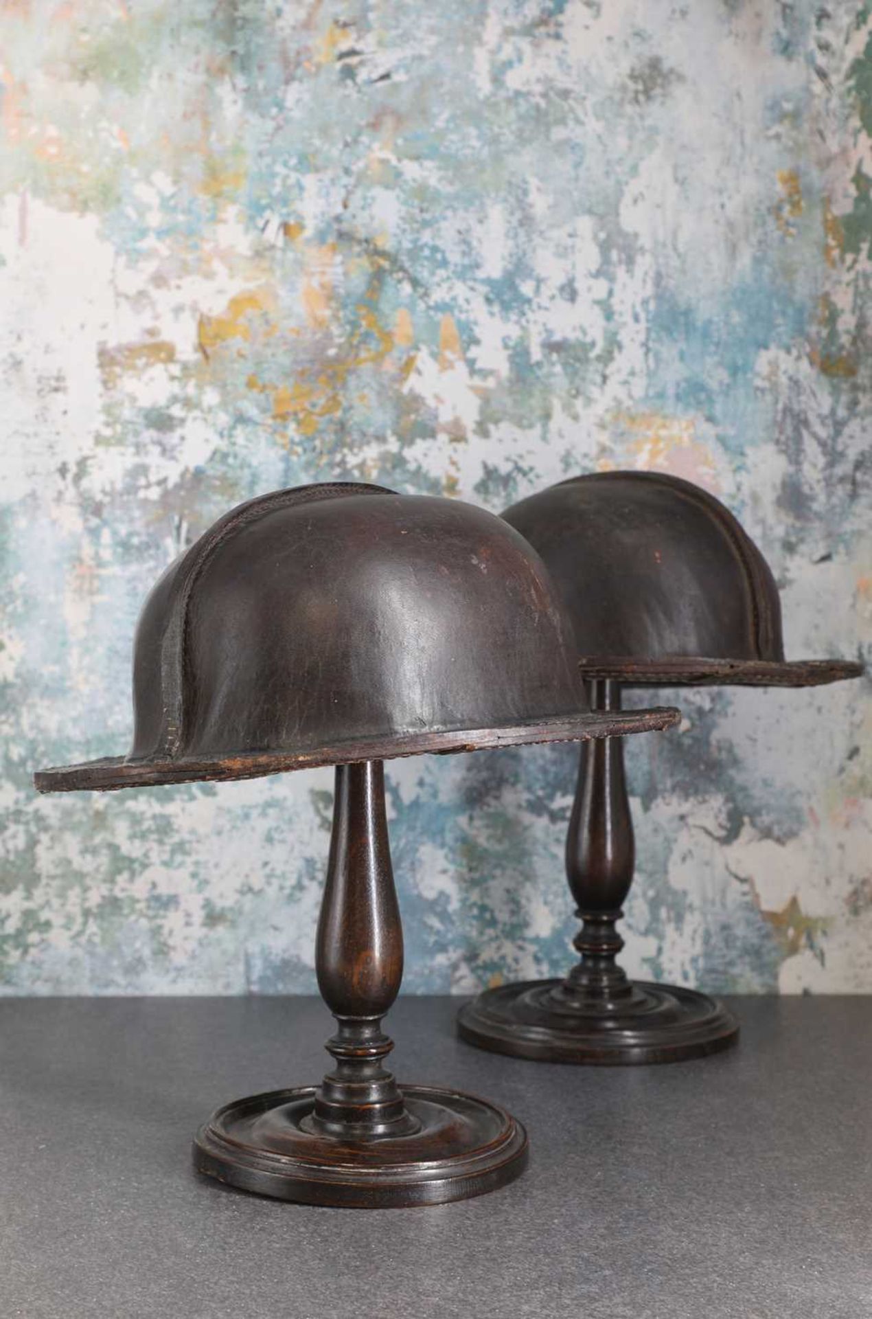 A pair of patinated leather miner's helmets, - Image 3 of 5