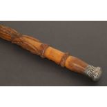 A regimental folk art fruitwood cane,