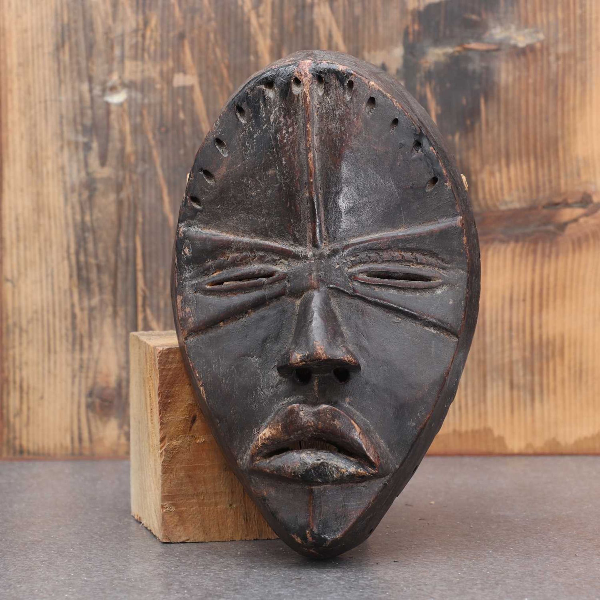 Dan society: a carved and patinated Dan mask, - Image 2 of 3