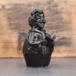 A glazed stoneware figurine,