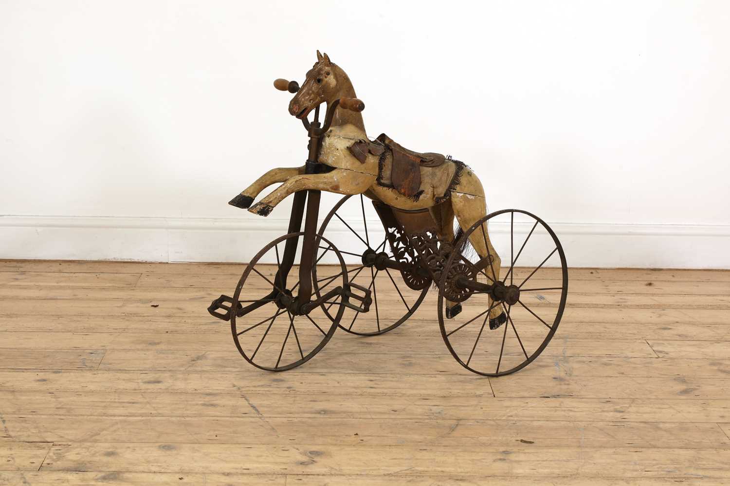 A Napoleon III child's horse tricycle,