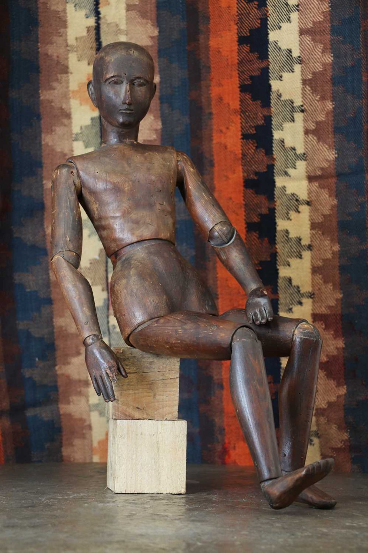 A carved wooden artist dummy or lay figure,