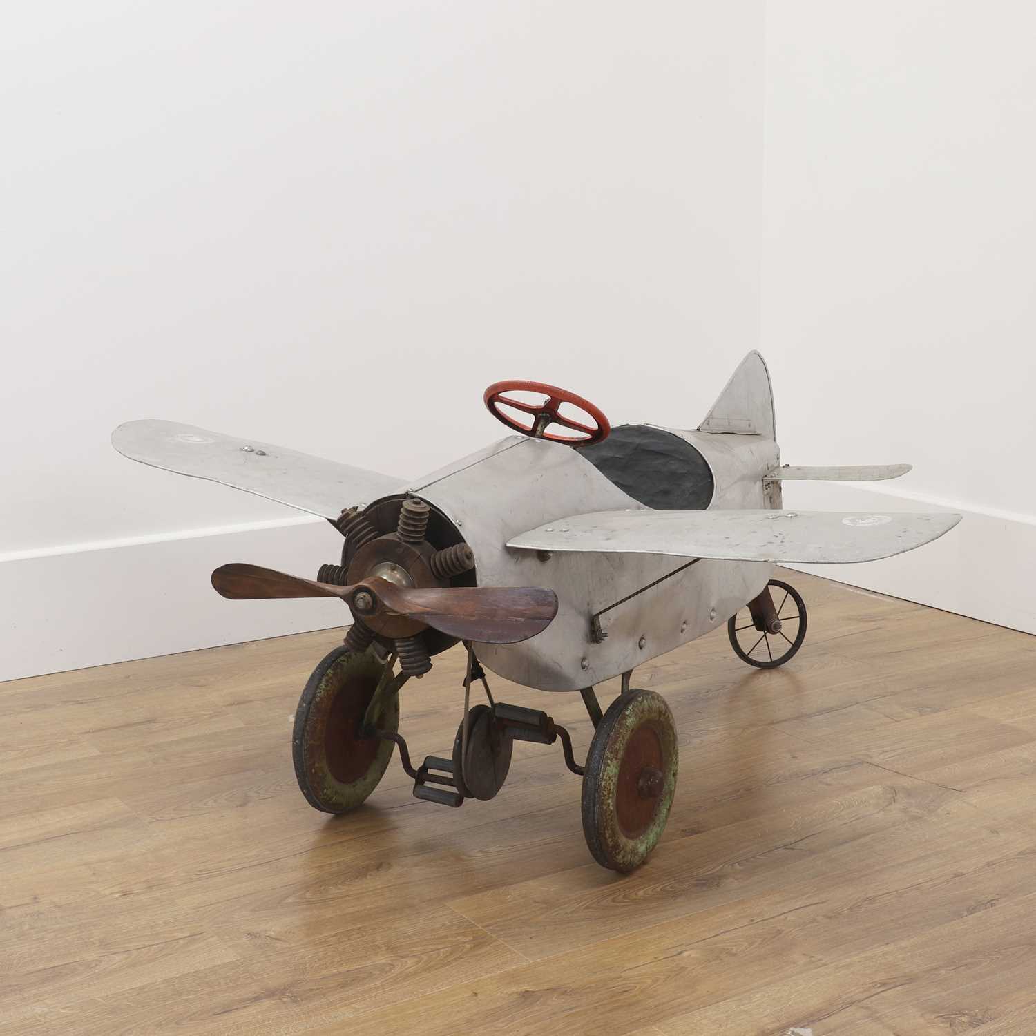 A child's pedal aeroplane,