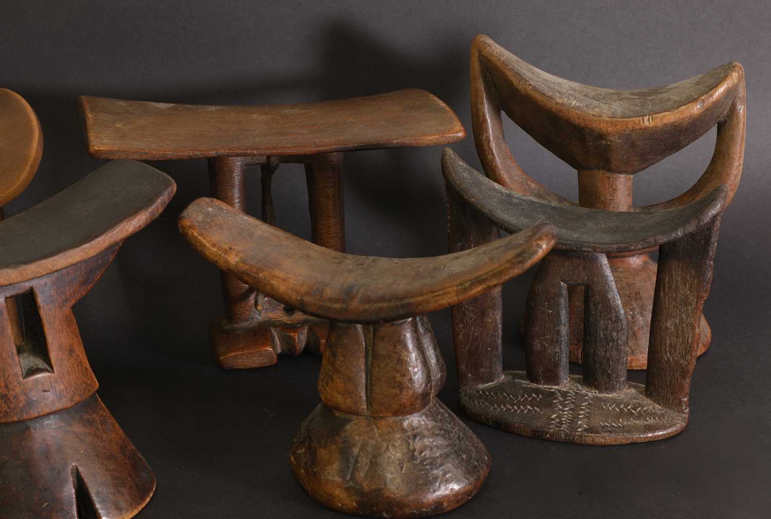 A collection of six carved Bari headrests, - Image 3 of 3