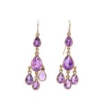 A pair of gold and amethyst drop earrings,