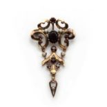 A 9ct gold garnet brooch pendant,