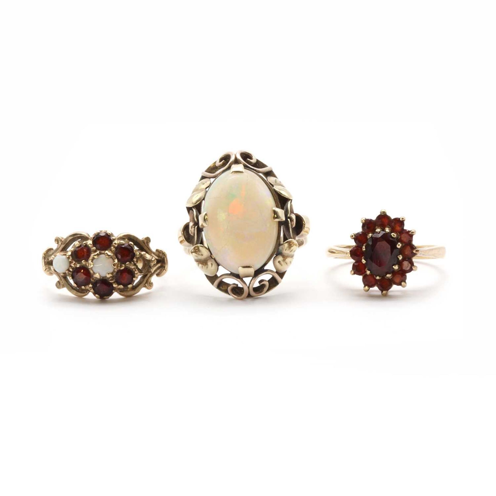 A gold single stone opal ring,