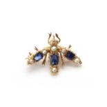 A gold sapphire and split pearl bee brooch,