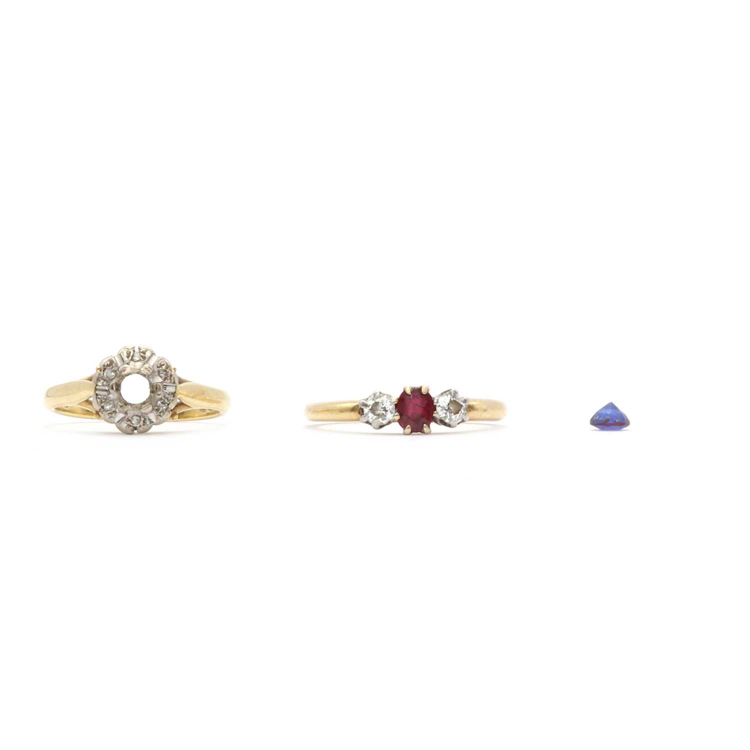 A ruby and diamond three stone ring,
