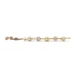 A gold pearl and diamond bar brooch,