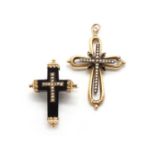 An onyx and split pearl cross brooch,