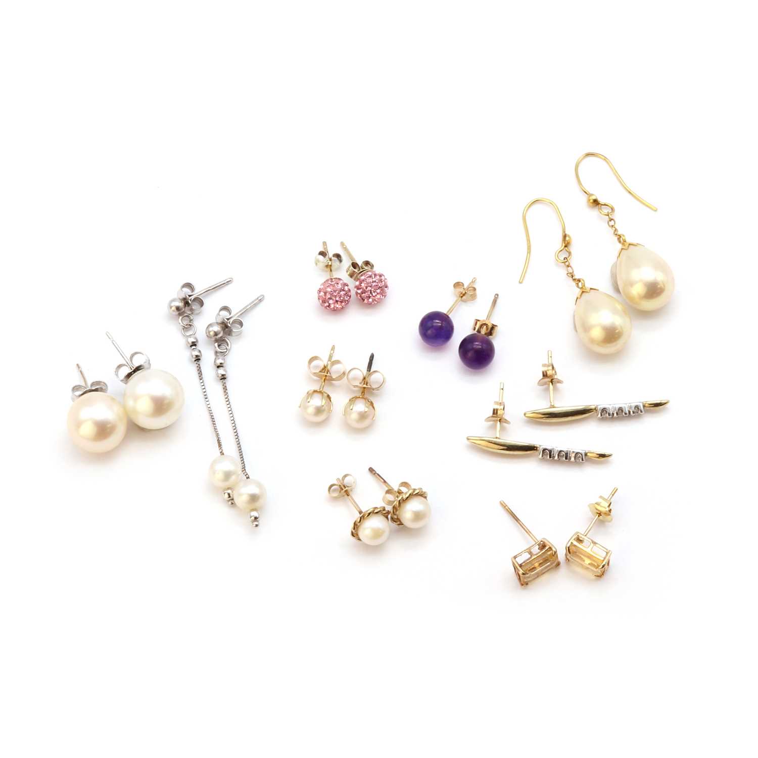 Nine pairs of earrings,