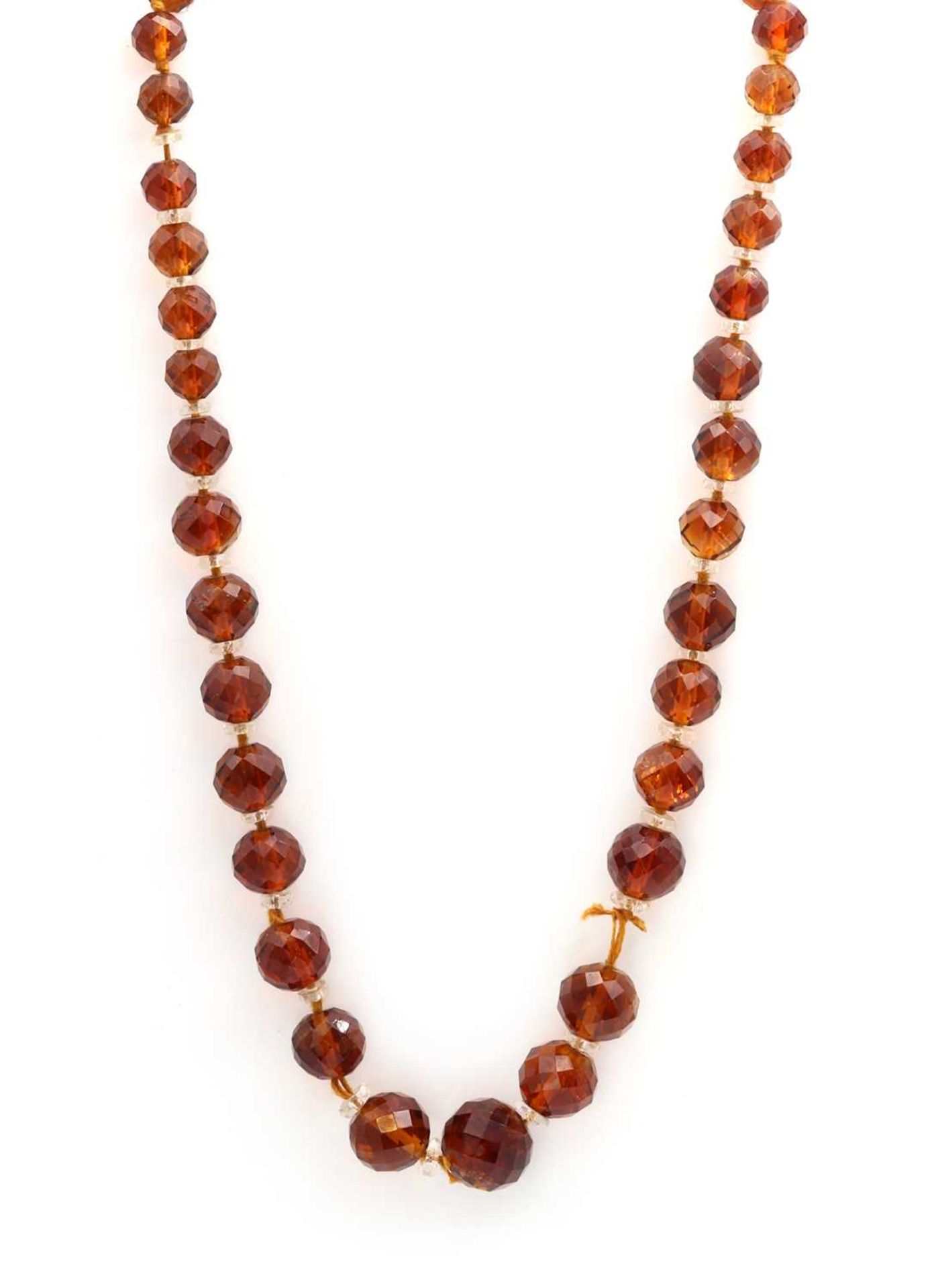 A single row graduated faceted citrine bead necklace,