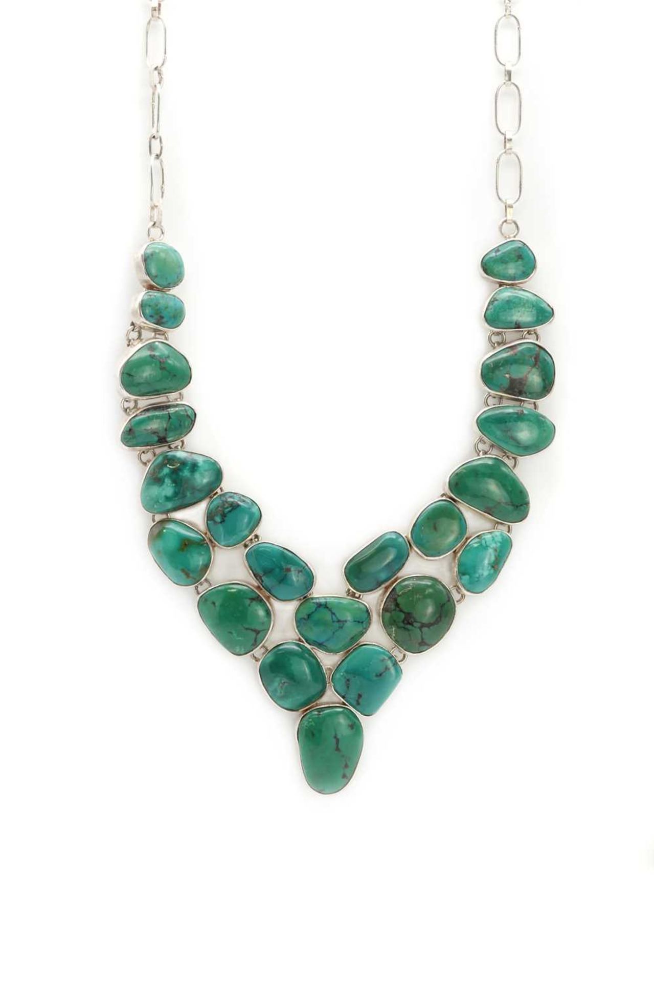 A multi-stone silver and turquoise 'V' shape necklace,