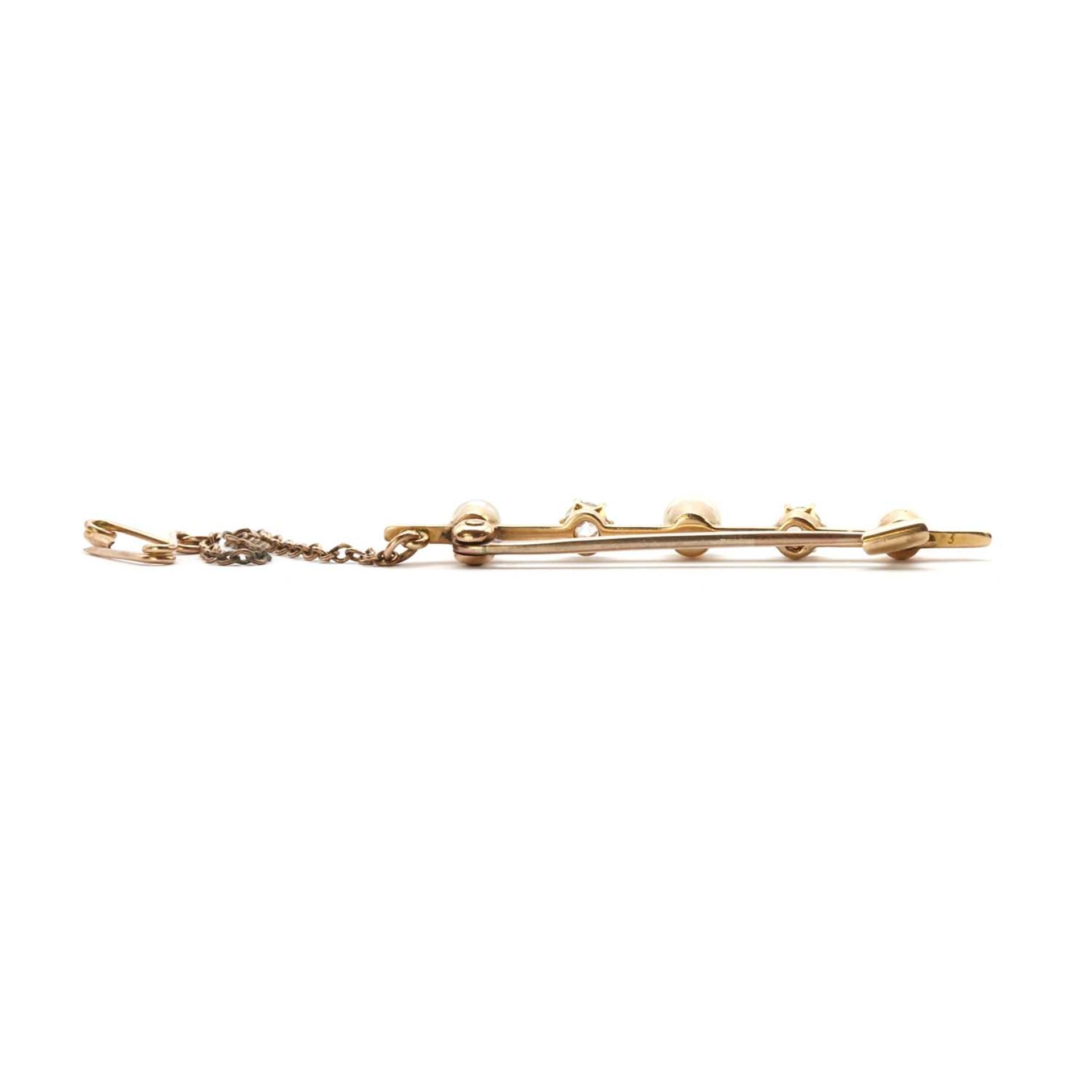 A gold pearl and diamond bar brooch, - Image 2 of 2