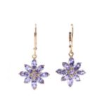 A pair of gold tanzanite and diamond earrings,