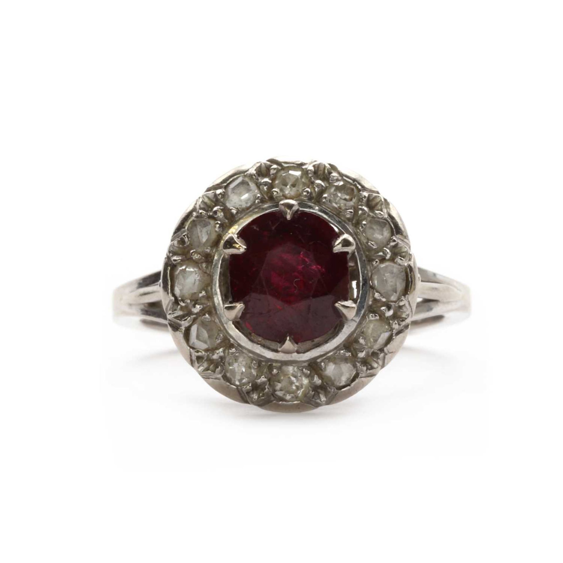 A white gold ruby and diamond cluster ring,