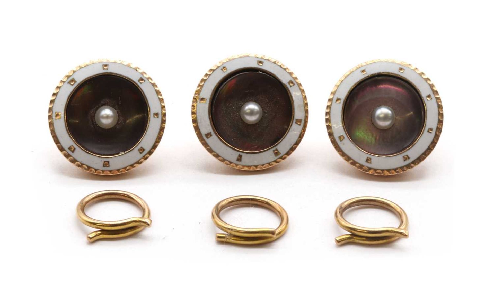 A cased set of gold split pearl, mother-of-pearl and enamel buttons,