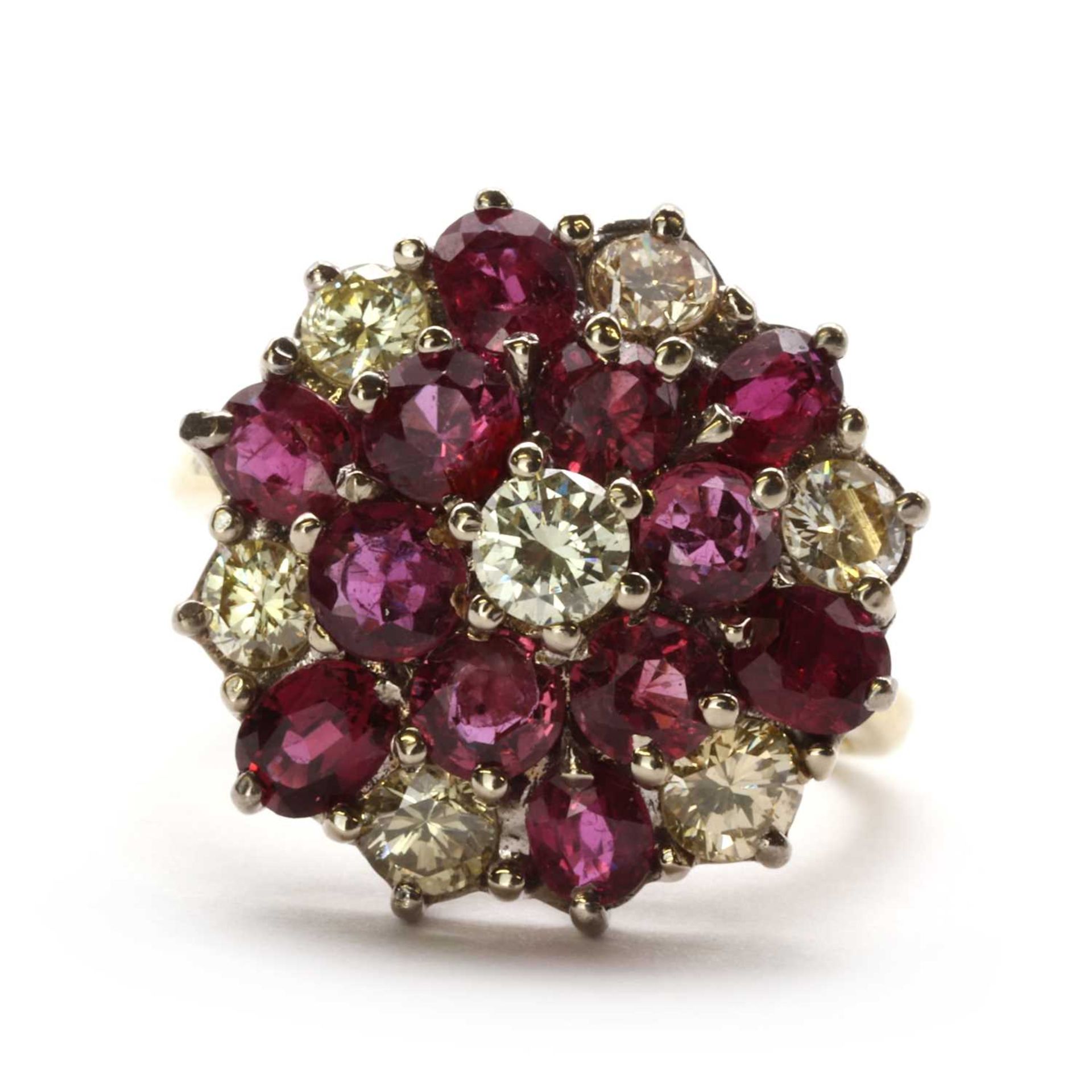 An 18ct gold ruby and diamond cluster ring,