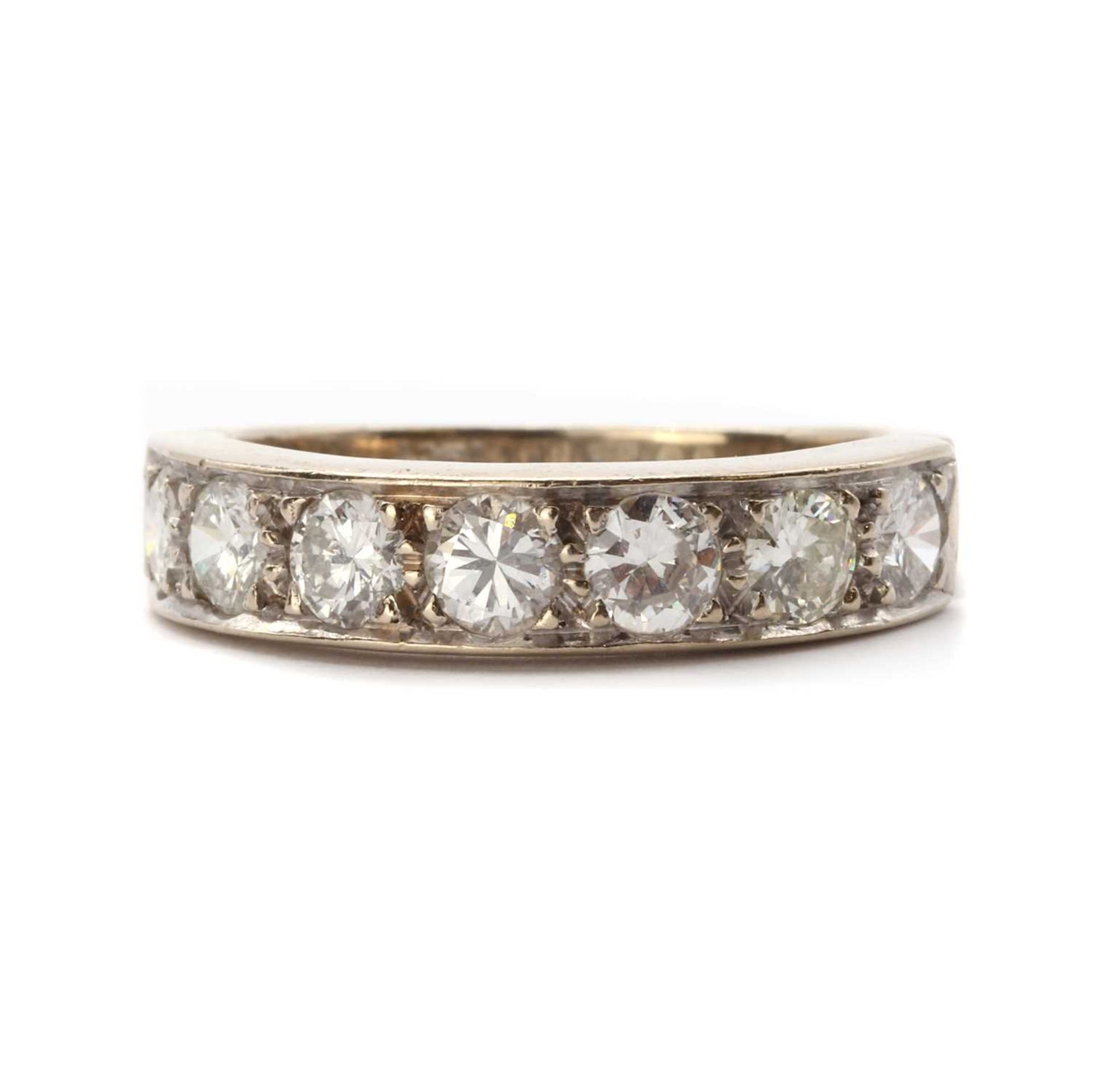 A white gold diamond half eternity ring,