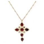 A late 18th century flat cut garnet and black dot quartz cross,