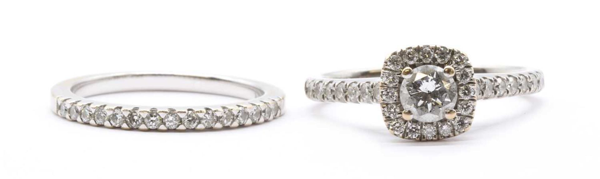 An 18ct white gold wedding and engagement ring set,