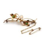 An Art Nouveau gold opal and demantoid garnet bar brooch, retailed by Liberty,